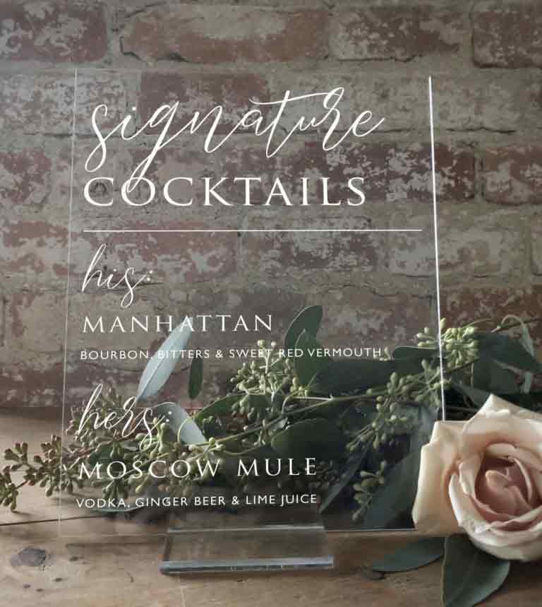 Celebrate with a Acrylic Signature Cocktail Sign While you agree that your love for each other is true, you don’t see eye-to-eye when it comes to which favorite adult beverage to serve guests. No matter – an acrylic signature cocktail sign lets you both celebrate with a specialty drink of choice.