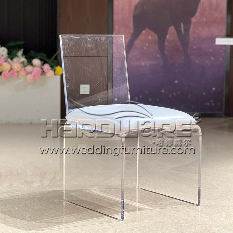 Acrylic dining chair with white leather cushion
