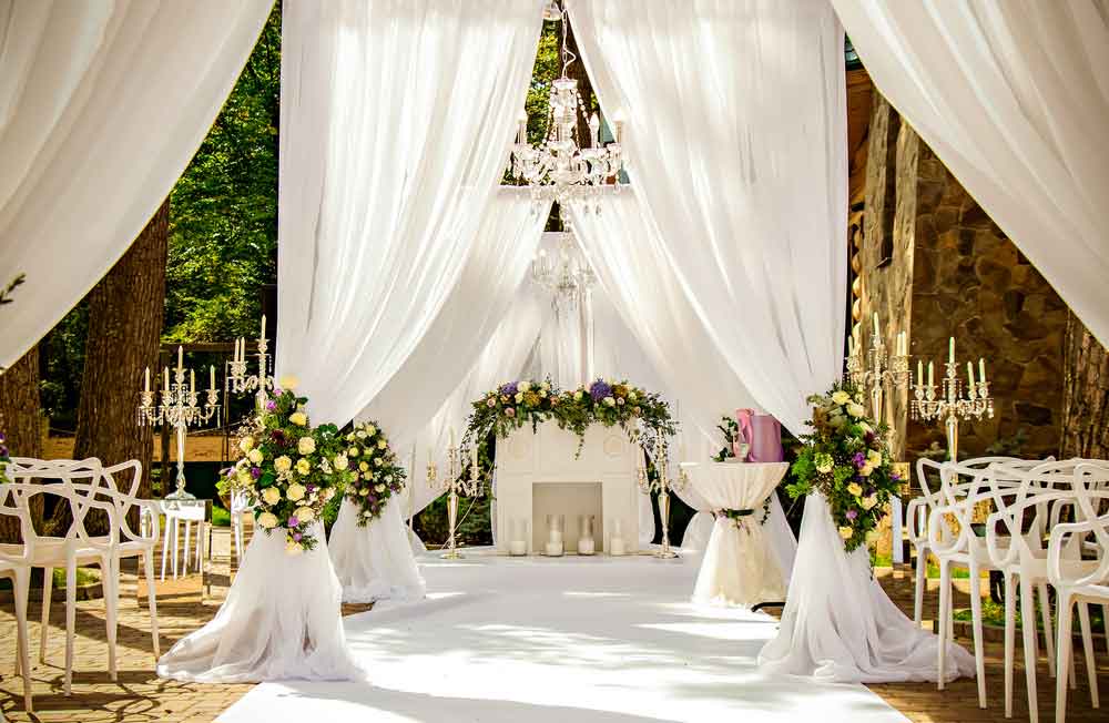 8 Magical Ways to Drape a Room for a Wedding